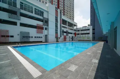 a swimming pool in the middle of a building at The Anderson Cozy Deluxe Homestay in Ipoh