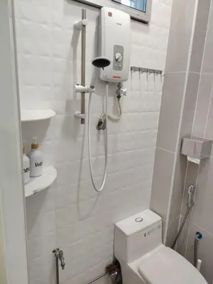 a small bathroom with a shower with a toilet at Jed Lifestyle Studio in Kepala Batas