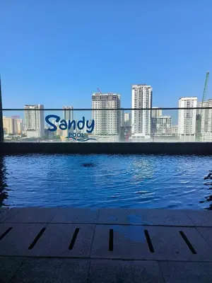 a swimming pool with a view of the city at Urban Suites, Penang in George Town