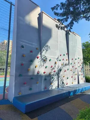 a climbing wall in a building with a climbing gym at Urban Suites, Penang in George Town