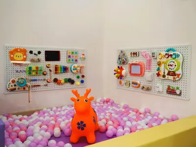 a room with a lot of balls and an orange toy at Kidello Home Ipoh Indoor Private Playground in Ipoh