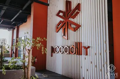a sign on the side of a building at Ipoh Town Piccadilly Premium Suites by Verve 3B2B in Gua Sai