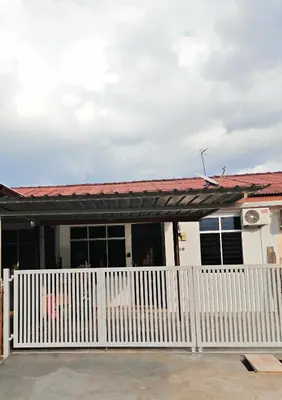 a white picket fence in front of a house at Yoland Homestay Baling Kedah in Baling