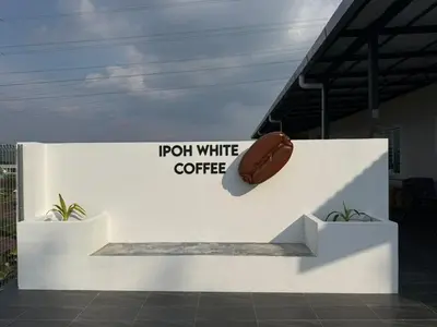a sign with a football sitting on a wall at Rustic Vibe Pool Bungalow Karaoke 5R7B for 22pax in Ipoh