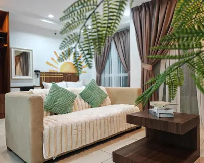 a living room with a couch and a table at Mansion One Studio VIP Parking Gleneagles Gurney in George Town