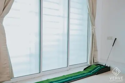 a window with a green dog bed next to it at Ipoh Summer Suite by Veve EECH05 in Gua Sai