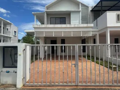 a white fence in front of a house at Raub Colonial 208 Homestay in Raub