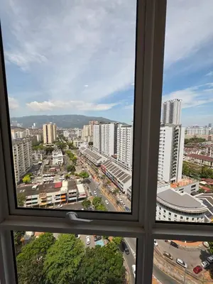 a view of a city from a window at StayLuxe SGS 2BR Suite in George Town