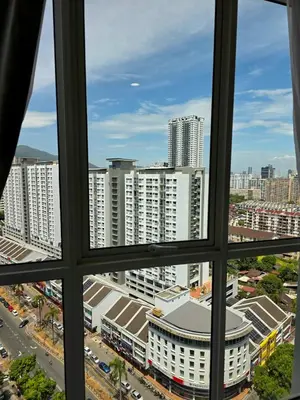 a view from a window of a city at StayLuxe SGS 2BR Suite in George Town