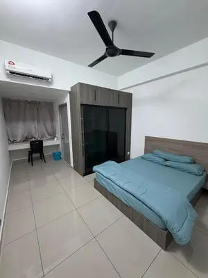 a bedroom with a bed and a ceiling fan at B-Ulike-HomeStay-3Room-TheVenus in Sitiawan