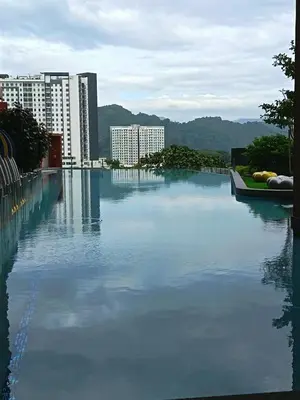 a large body of water with buildings in the background at LMS ipoh town in Ipoh