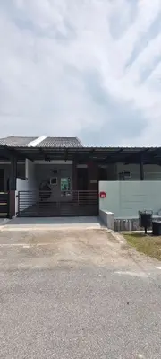 a house with a solar roof on top of it at 3Q Impiana Roomstay Teluk Senangin in Lumut