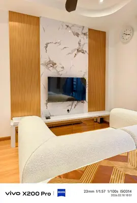 a living room with a tv and a couch at Adik Aisyah Hotel Studio Room Royal Silver centrum Brinchang in Brinchang