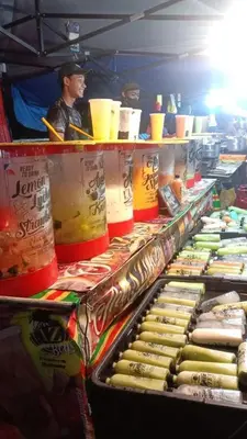 a buffet line with hot dogs and other food at Comfort On the Hill in Cameron Highlands