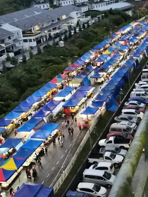an overhead view of a parking lot with many tents at Comfort On the Hill in Cameron Highlands