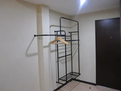 a shelf in the corner of a room at Garden Inn, Penang in George Town