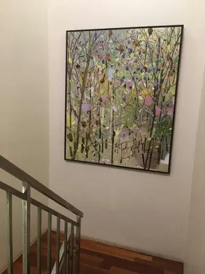 a painting of a tree on a wall at Marina Oriental Hotel in Butterworth