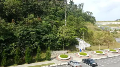 an overhead view of a road with cars on it at Cameron Forest Home - Golden Hills in Cameron Highlands