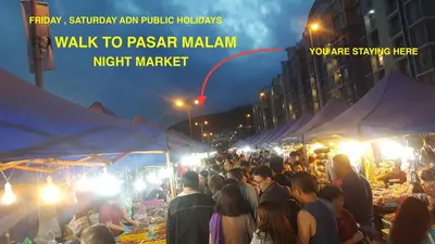 a crowd of people at a market at night at Cameron Forest Home - Golden Hills in Cameron Highlands