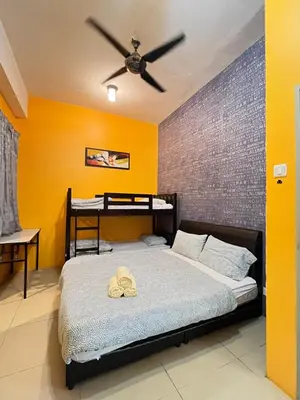 a bedroom with a bed with a ceiling fan at Cameron Forest Home - Golden Hills in Cameron Highlands
