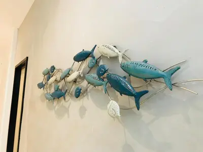 a group of lobsters hanging on a wall at Hotel Nelayan in Pangkor