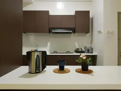 a kitchen with a coffee maker on a counter at Play Residence at Golden Hills in Cameron Highlands