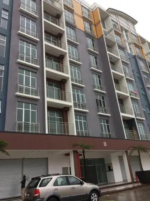 a car parked in front of a building at Cameron Barrington Square 1Room @ Golden Hill in Cameron Highlands