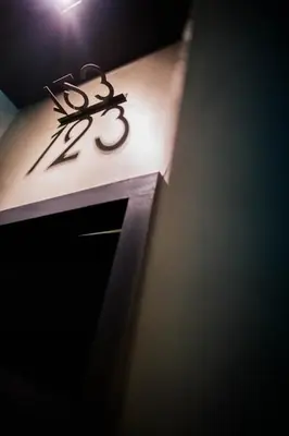 a pair of scissors sitting on top of a table at M Boutique Kampar in Kampar