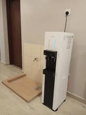a machine that is standing in a room at Hotel Dutaria in Ipoh
