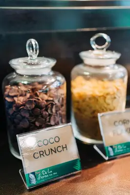 two glass jars filled with food on a table at Hotel De' La Ferns, Cameron Highlands in Cameron Highlands