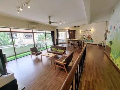 a large living room with a couch and chairs at GurneyVille in George Town