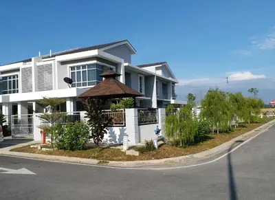 a house with a gazebo in front of a street at VVIP Homestay Villa Proton City in Tanjung Malim