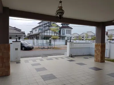 an open patio with a car parked in a parking lot at Sitiawan Homestay Entire Semi D house in Sitiawan