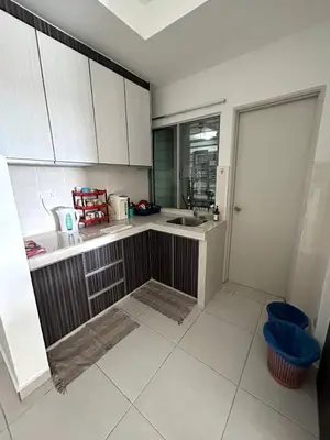 a kitchen with a sink and a counter top at Sekinchan SeaBreeze Homestay \u9002\u8015\u5e84\u6d77\u98ce\u5439\u6c11\u5bbf in Sekincan