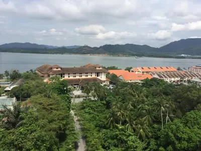 an aerial view of a resort and a lake at Lumut Valley Condominium in Lumut