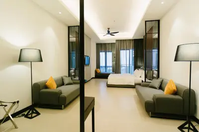 a living room with two couches and a couch at Avillion Cameron Highlands in Cameron Highlands