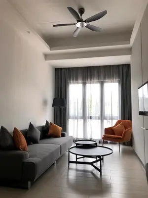 a living room with a couch and a ceiling fan at Avillion Cameron Highlands in Cameron Highlands