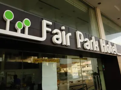 a store front with a sign for air path hotel at Fair Park Hotel in Ipoh