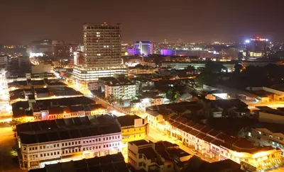 a city lit up at night with buildings at H2H - Marine Home @ Majestic Ipoh (8~10 Guests) in Ipoh