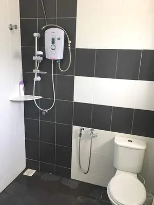 a bathroom with a shower and a toilet in it at W9 atGoldenHills NightMarket WiFi 4R BBQ in Cameron Highlands
