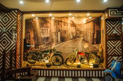 a display window with two motorcycles in a street at Wan Alyasa Hotel in Cameron Highlands