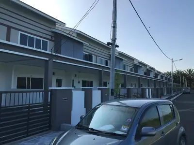 a car parked in front of a building at My STW Home 2 in Sitiawan
