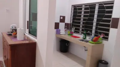 a bathroom with a sink and a mirror at MaiHomestay Seri Iskandar in Seri Iskandar