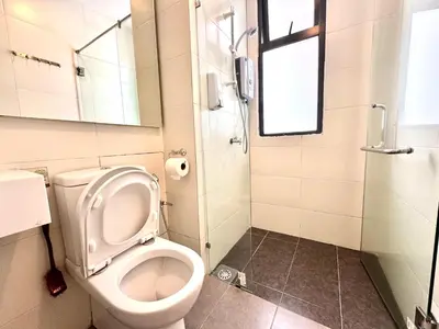 a bathroom with a toilet and a shower at Themework Homestay@Cameron Highlands in Cameron Highlands