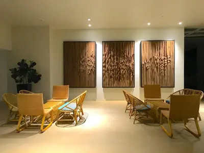 a room with chairs and a table and a table and chairs at By The Sea Suite,Batu Ferringhi in Batu Ferringhi