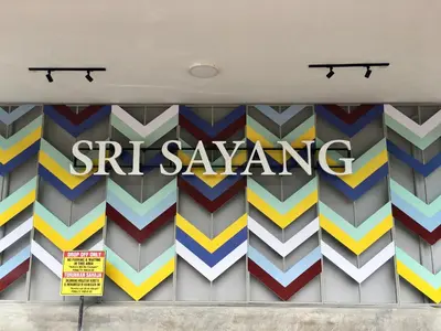 a store front with a sakura sign on the wall at The Ferringhi Sea View at Sri Sayang in Batu Ferringhi