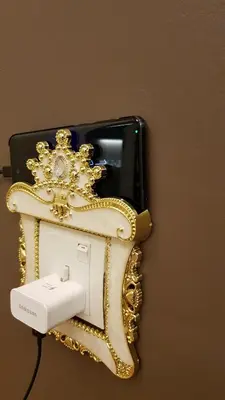 a cell phone is attached to a wall at Oasis Condominium in Ipoh