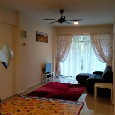 a living room with a couch and a window at Azizi&Yati Muslim Homestay Cameron Highlands in Cameron Highlands