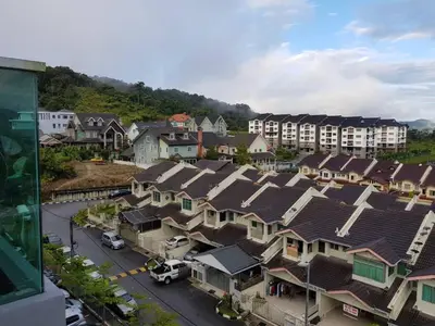 an aerial view of a residential neighborhood with houses at Azizi&Yati Muslim Homestay Cameron Highlands in Cameron Highlands