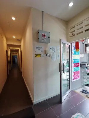 a room with a door and a hallway with at StarVilla Kinta River Front Medan Istana in Ipoh